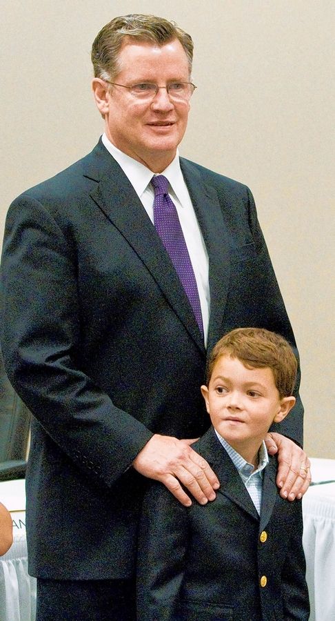 Bill Cadigan with his son Billy at the Illinois State Board of Elections headquarters in Springfield.