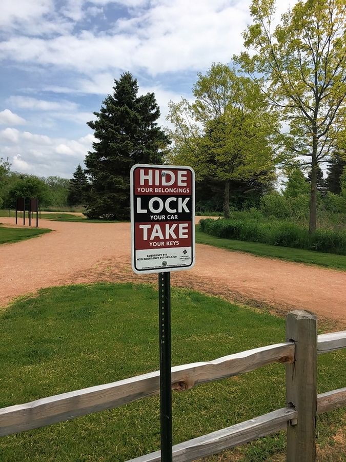 Signs posted at forest preserves in Lake County caution visitors not to leave valuables in sight in their vehicles, as they become easy targets for break-ins.