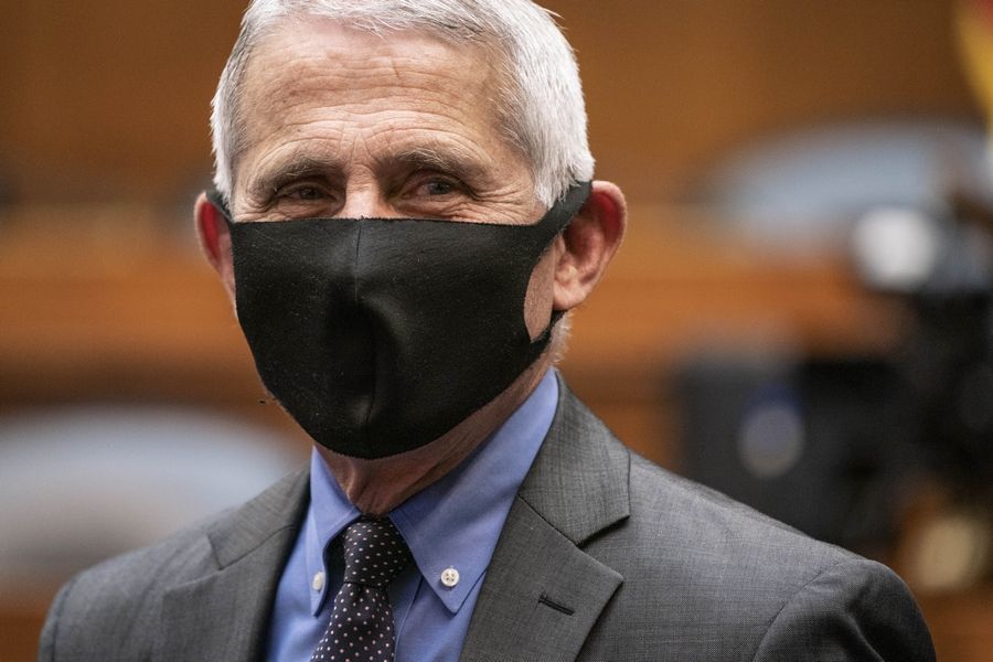 Director of the National Institute of Allergy and Infectious Diseases Dr. Anthony Fauci arrives Tuesday to testify before a House Committee on Energy and Commerce on the Trump administration's response to the COVID-19 pandemic on Capitol Hill in Washington.