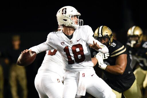 Stanford quarterback Tanner McKee (18) looks to pass against Vanderbilt in the first half of an NCAA college football game Saturday, Sept. 18, 2021, in Nashville, Tenn.