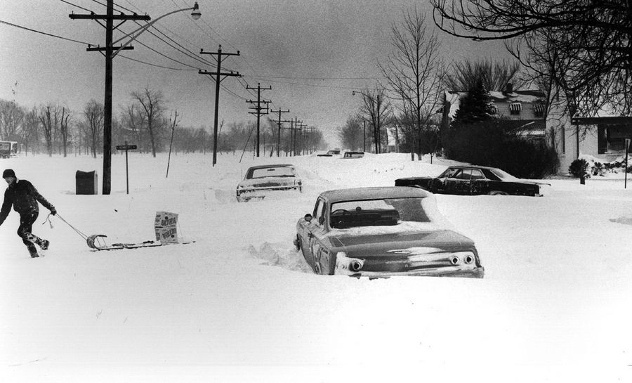 Cars blocked the Arlington Heights intersection of Kennicott Avenue and Oakton Street after the 1967 blizzard, but that didn't stop a resourceful resident from getting about.