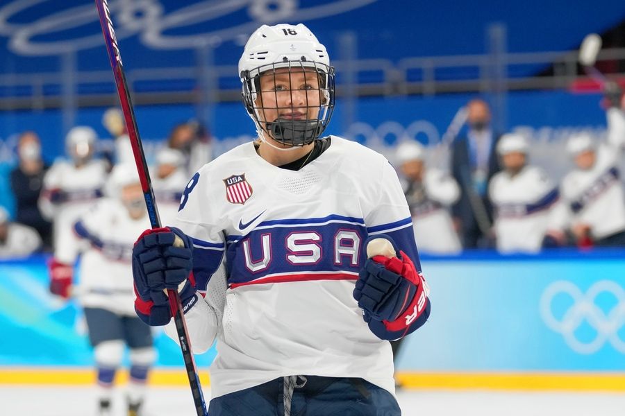 Northbrook's Jesse Compher celebrates after scoring a goal against Switzerland during a preliminary rounds at the 2022 Winter Olympics in Beijing. The Olympic silver medalist is using an extra year of eligibility granted by the NCAA to winter sports athletes from the 2020-21 academic year to play for the Badgers after earning a bachelor's degree from Boston University. She'll be pursuing a master's degree in Mad Town.