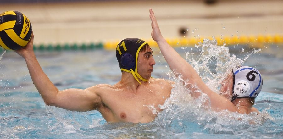 Joe Lewnard/jlewnard@dailyherald.comGlenbrook South's Jorg Yonan shoots and scores as Prospect's Colin Koziol defends during the Glenbrook South boys water polo invite in Glenview Friday.