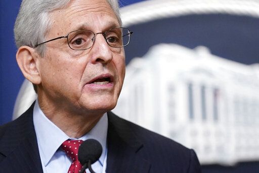 Attorney General Merrick Garland speaks at a news conference to announce actions to enhance the Biden administration's environmental justice efforts, Thursday, May 5, 2022, at the Department of Justice in Washington.
