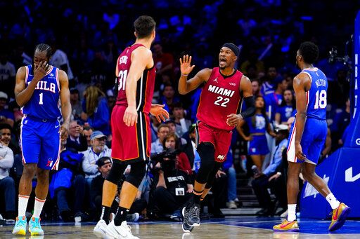 Miami Heat's Jimmy Butler (22) reacts during the second half of Game 6 of an NBA basketball second-round playoff series against the Philadelphia 76ers, Thursday, May 12, 2022, in Philadelphia.