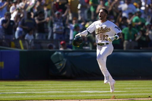 Oakland Athletics' Luis Barrera celebrates after hitting a three-run home run against the Los Angeles Angels during the ninth inning of the first baseball game of a doubleheader in Oakland, Calif., Saturday, May 14, 2022.