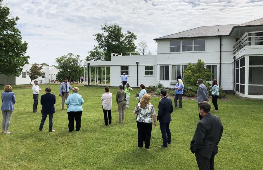 Lake County Forest Preserve District commissioners tour the historic Adlai E. Stevenson home in Mettawa in May 2021. At the time, repairing the house and adjoining service building was estimated at $1.1 million.