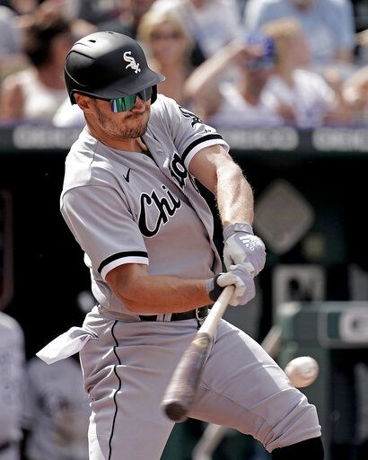 Chicago White Sox's Adam Engel hits an RBI single during the seventh inning of a baseball game against the Kansas City Royals Thursday, May 19, 2022, in Kansas City, Mo.