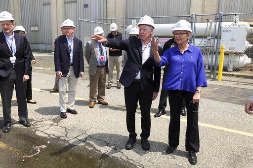 U.S. Energy Secretary Jennifer Granholm, right, and Democratic U.S. Rep. Joe Courtney, second from right, tour the Millstone Nuclear Power Station in Waterford, Conn., Friday, May 20, 2022. They are both working to change how spent nuclear fuel is stored nationwide to solve a decades long stalemate.