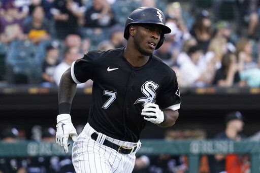 Chicago White Sox's Tim Anderson runs to first base after hitting a single during the first inning of a baseball game against the New York Yankees in Chicago, Saturday, May 14, 2022.
