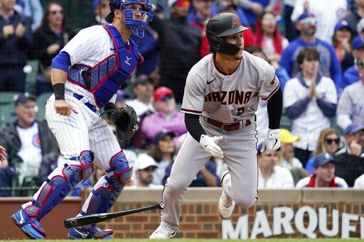 Arizona Diamondbacks' Alek Thomas leaves the batter's box after hitting an RBI single against the Chicago Cubs during the seventh inning of a baseball game in Chicago, Saturday, May 21, 2022.