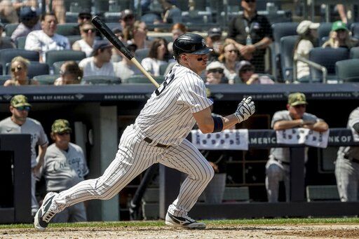 New York Yankees third baseman Josh Donaldson (28) makes a swinging strike on a pitch during the third inning of a baseball game against Chicago White Sox, Saturday May 21, 2022, in New York.