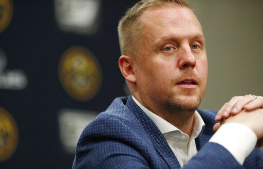 FILE - Denver Nuggets president of basketball operations Tim Connelly considers a question during a news conference on May 21, 2019, in Denver. A person familiar with the situation tells The Associated Press on Thursday, May 19, 2022, that Connelly is in discussions with the Minnesota Timberwolves about their vacant president of basketball operations role.