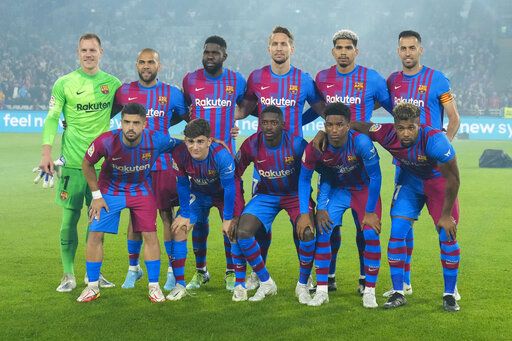 FC Barcelona pose for ateam photo ahead of friendly soccer match against the A-League All Stars' at Stadium Australia in Sydney, Australia, Wednesday, May 25, 2022.