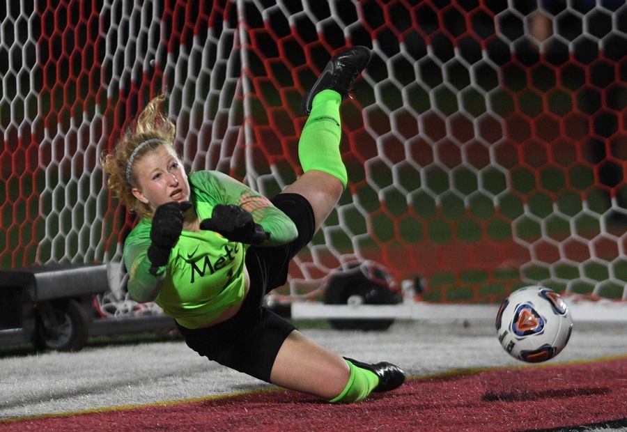 Metea Valley goalkeeper Julia Straub stops the last Barrington shootout attempt in the Class 3A IHSA state girls soccer championship game in Naperville on Saturday, June 4, 2022.