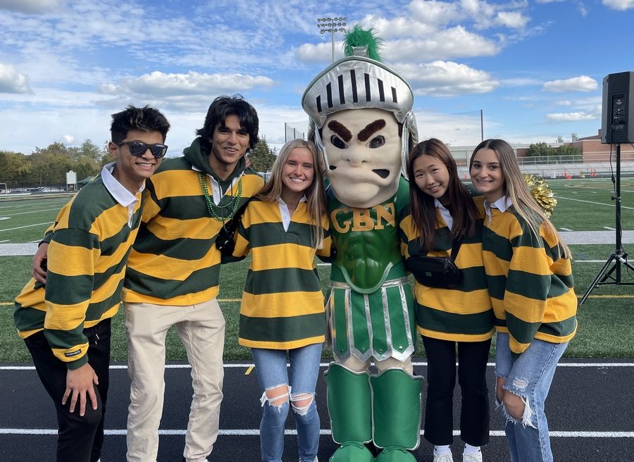 Glenbrook North students with the school's Spartan mascot.