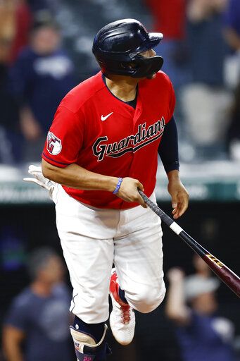 Cleveland Guardians' Josh Naylor watches his game-winning, two-run home run against the Minnesota Twins during the 10th inning of a baseball game Wednesday, June 29, 2022, in Cleveland.