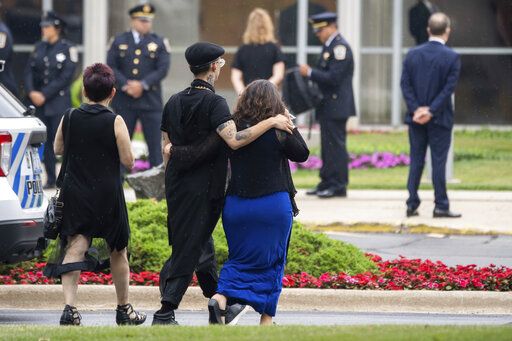 Mourners arrive for the funeral service for Jacquelyn Sundheim at North Shore Congregation Israel in Glencoe, Ill., Friday morning, July 8, 2022. Sundheim was one of the victims of the Fourth of July parade shooting in Highland Park, Ill.  (Pat Nabong/Chicago Sun-Times via AP)
