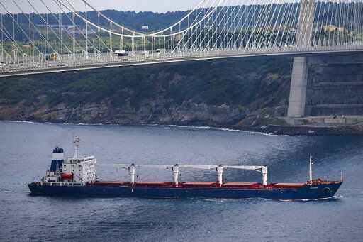 The Sierra Leone-flagged cargo ship Razoni sails under Yavuz Sultan Selim Bridge after being inspected by Russian, Ukrainian, Turkish and U.N. officials at the entrance of the Bosphorus Strait in Istanbul, Turkey, Wednesday, Aug. 3, 2022. Razoni, loaded up with 26,000 tons of corn, is the first cargo ship to leave Ukraine since the Russian invasion, and set sail from Odesa on Monday, August 1, 2022. Its final destination is Lebanon.