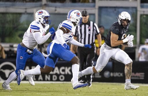 Central Florida running back Isaiah Bowser runs down field during an NCAA college football game against SMU in Orlando, Fla., Wednesday, Oct. 5, 2022. (Willie J. Allen Jr./Orlando Sentinel via AP)