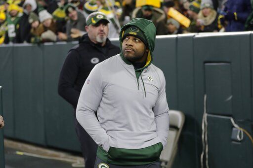 Green Bay Packers' Randall Cobb comes out of the locker room in street clothes during the second half of an NFL football game against the Los Angeles Rams Sunday, Nov. 28, 2021, in Green Bay, Wis.